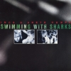 SWIMMING WITH SHARKS SWIMMING WITH SHARKS